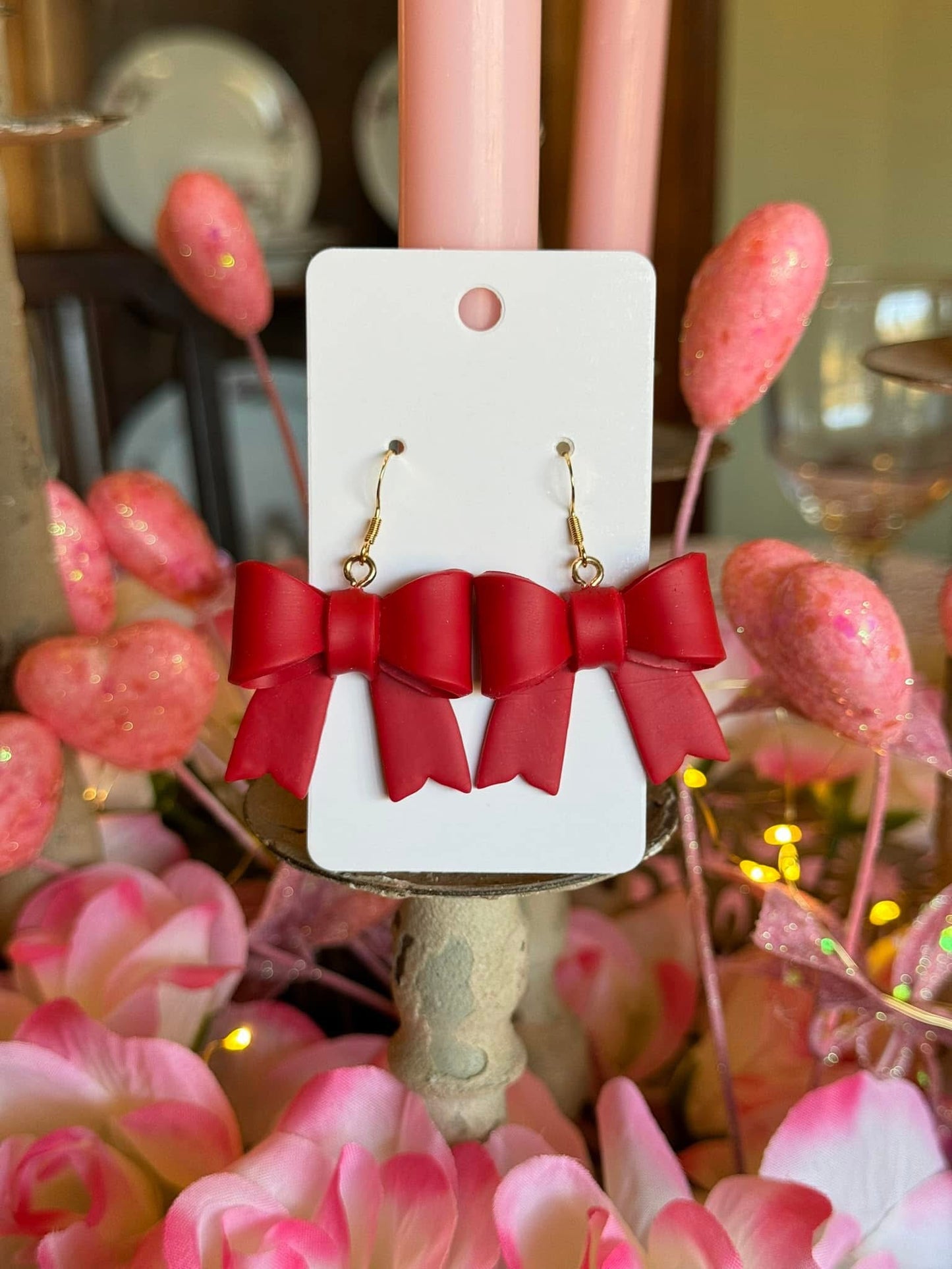 Red bow dangles