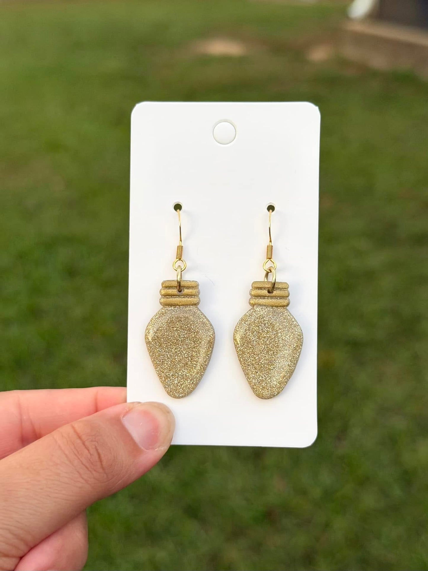 Gold lightbulb dangles