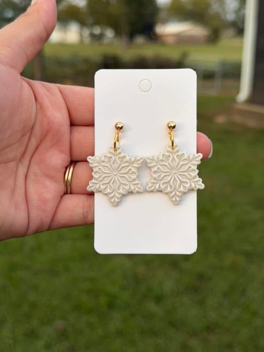 Snowflake dangling earrings