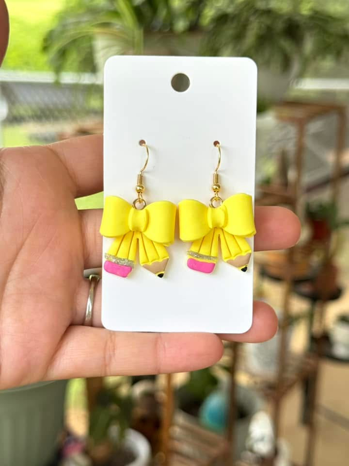 Pencil bow clay dangles